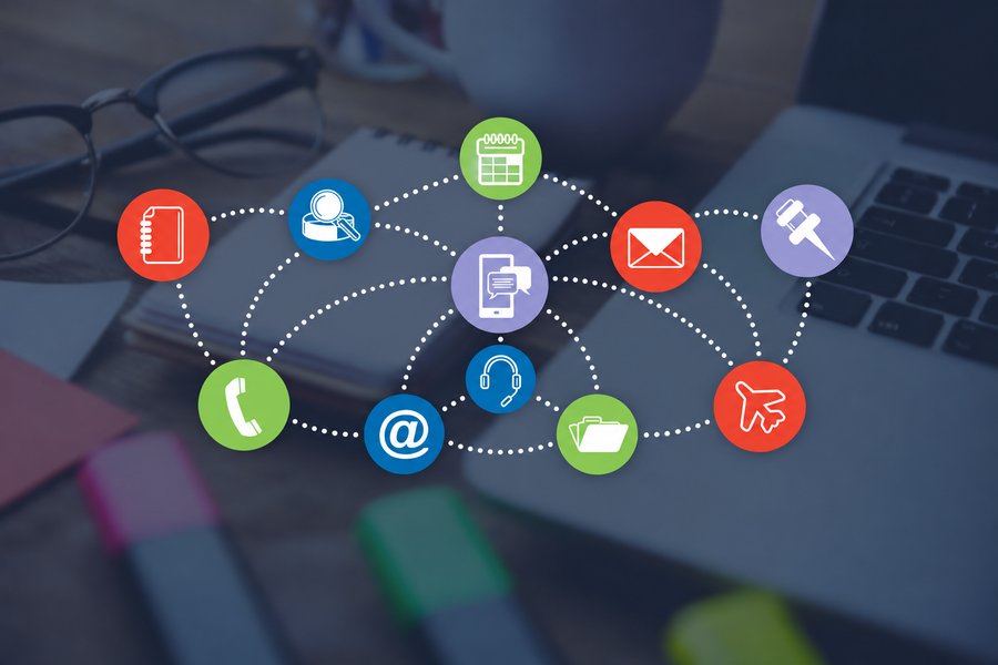 Connected contact and communication icons on a desk